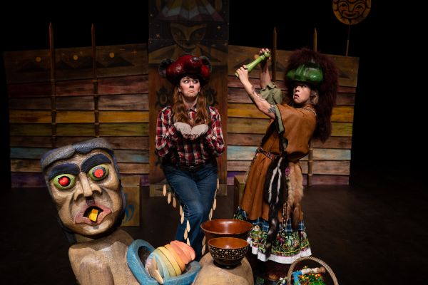 An actor swinging a large stick