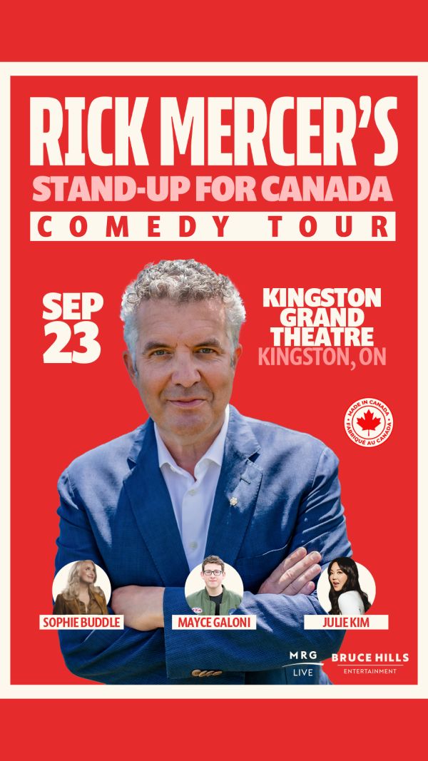 grey haired white male in a blue jacket with his arms crossed on a red background