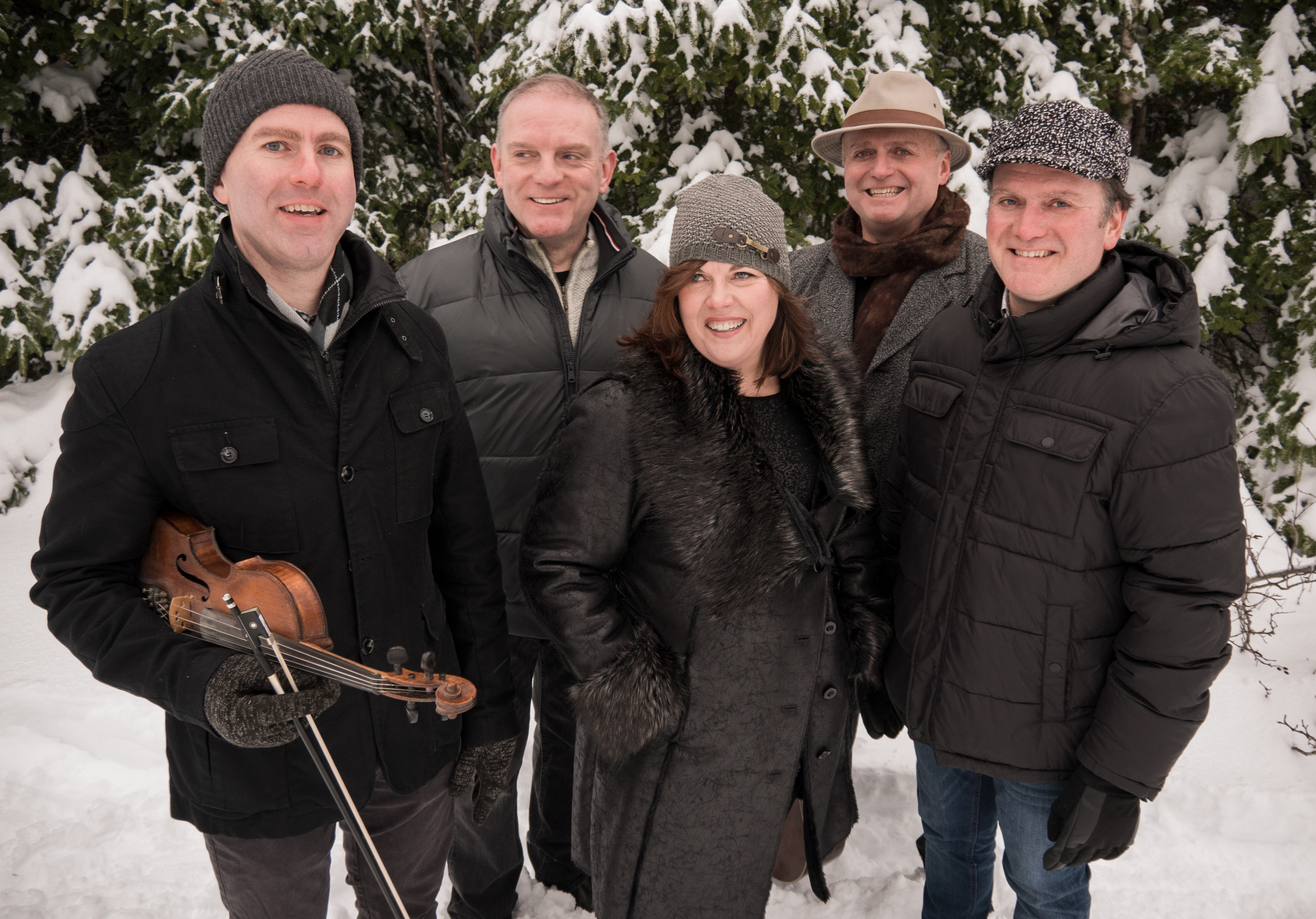 The Barra MacNeils - An East Coast Christmas The Barra MacNeils with a fiddle in the snow