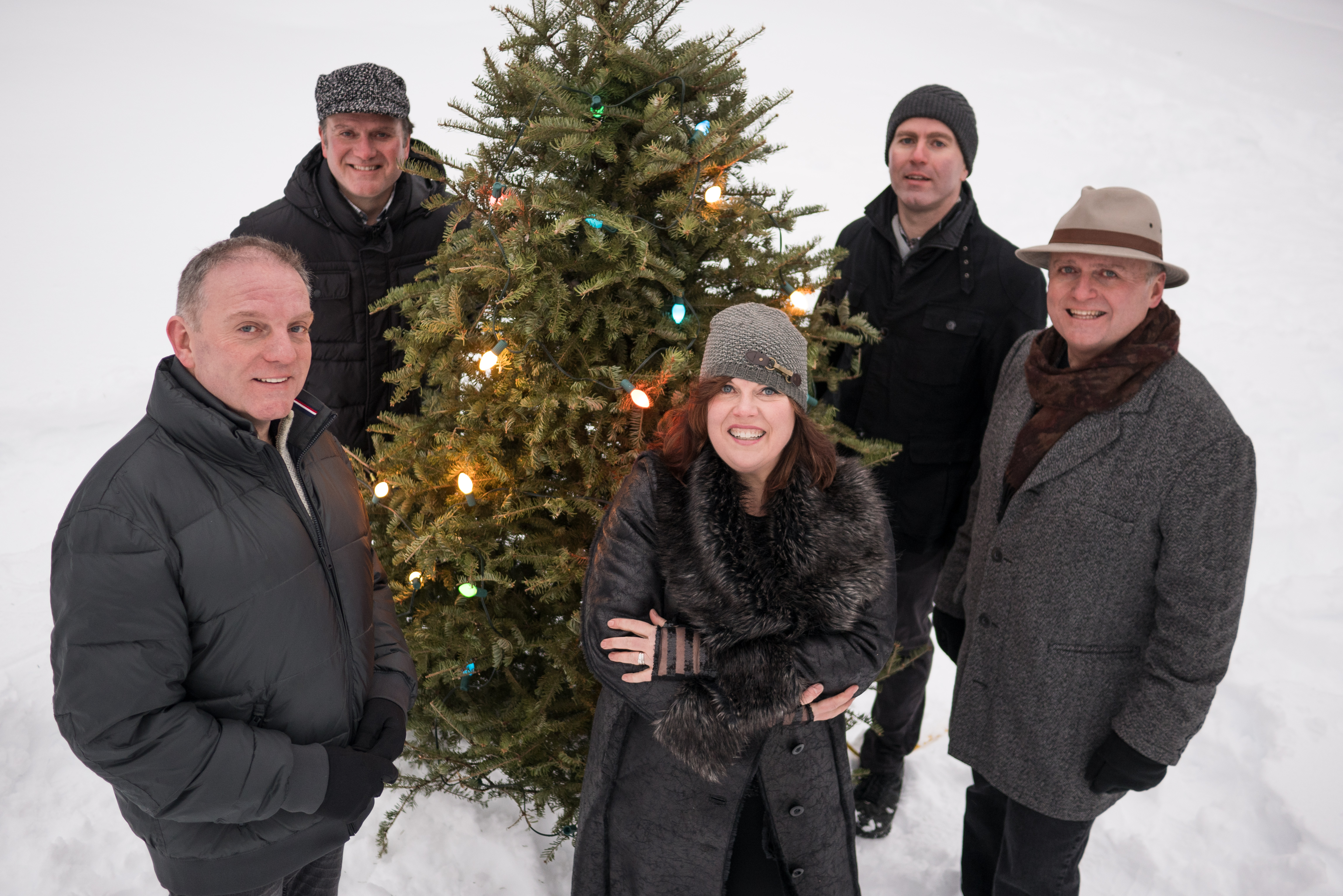 The Barra MacNeils - An East Coast Christmas The Barra MacNeils, outside in front of a lite Christmas Tree