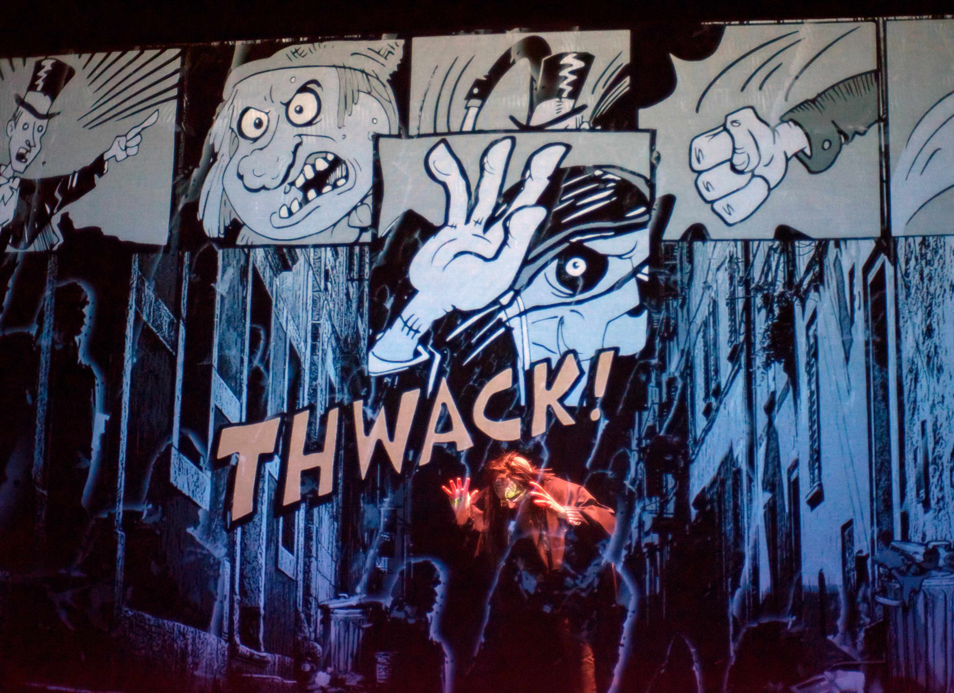 cartoon graffiti with the word THWACK mid-graphic