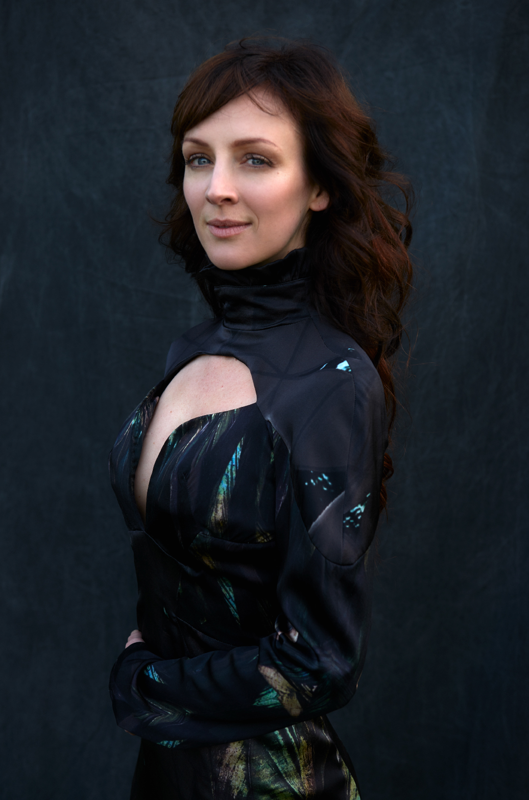 Sarah Slean, a brunette with all black clothing