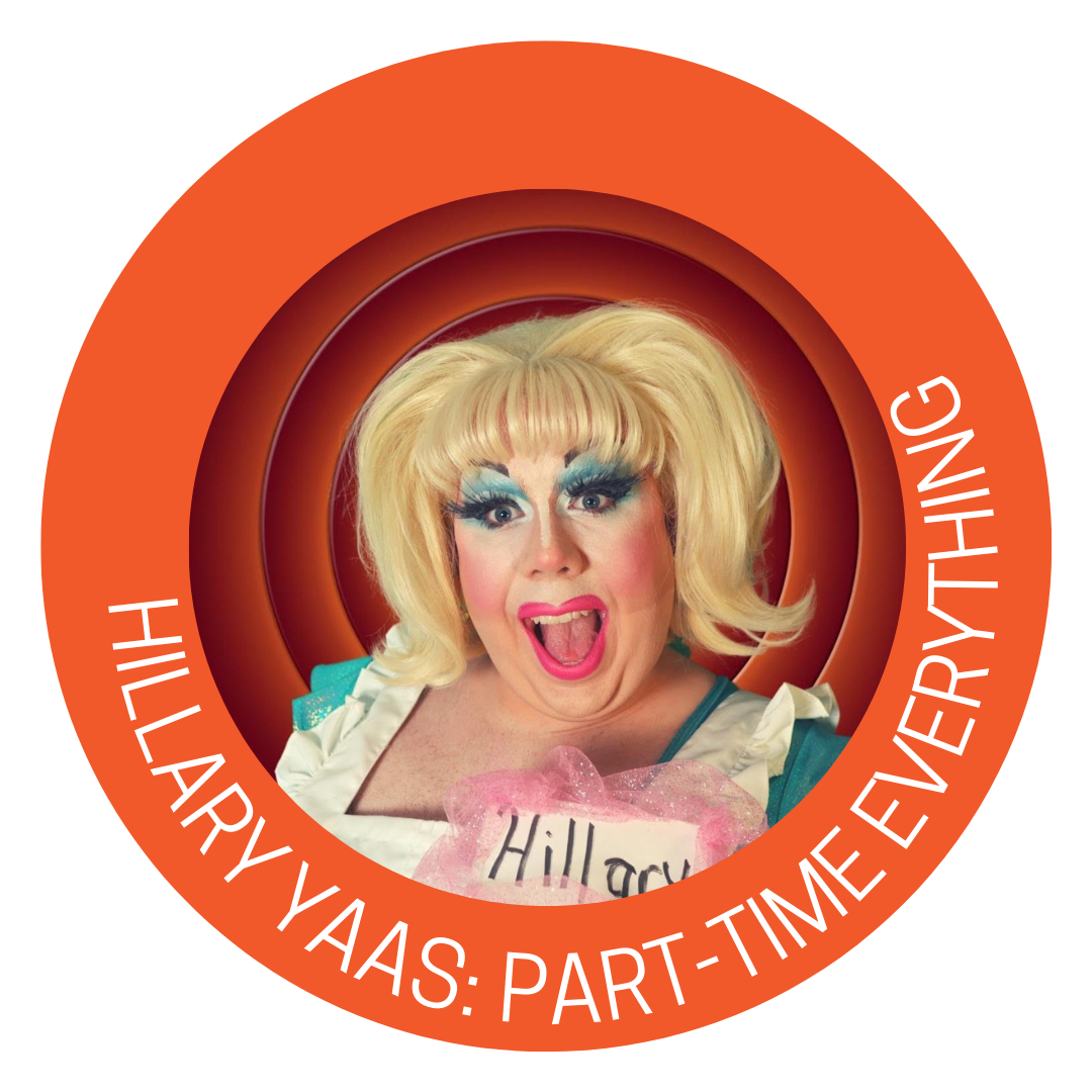 Happy, mouth wide open drag queen in a bleach blonde wig