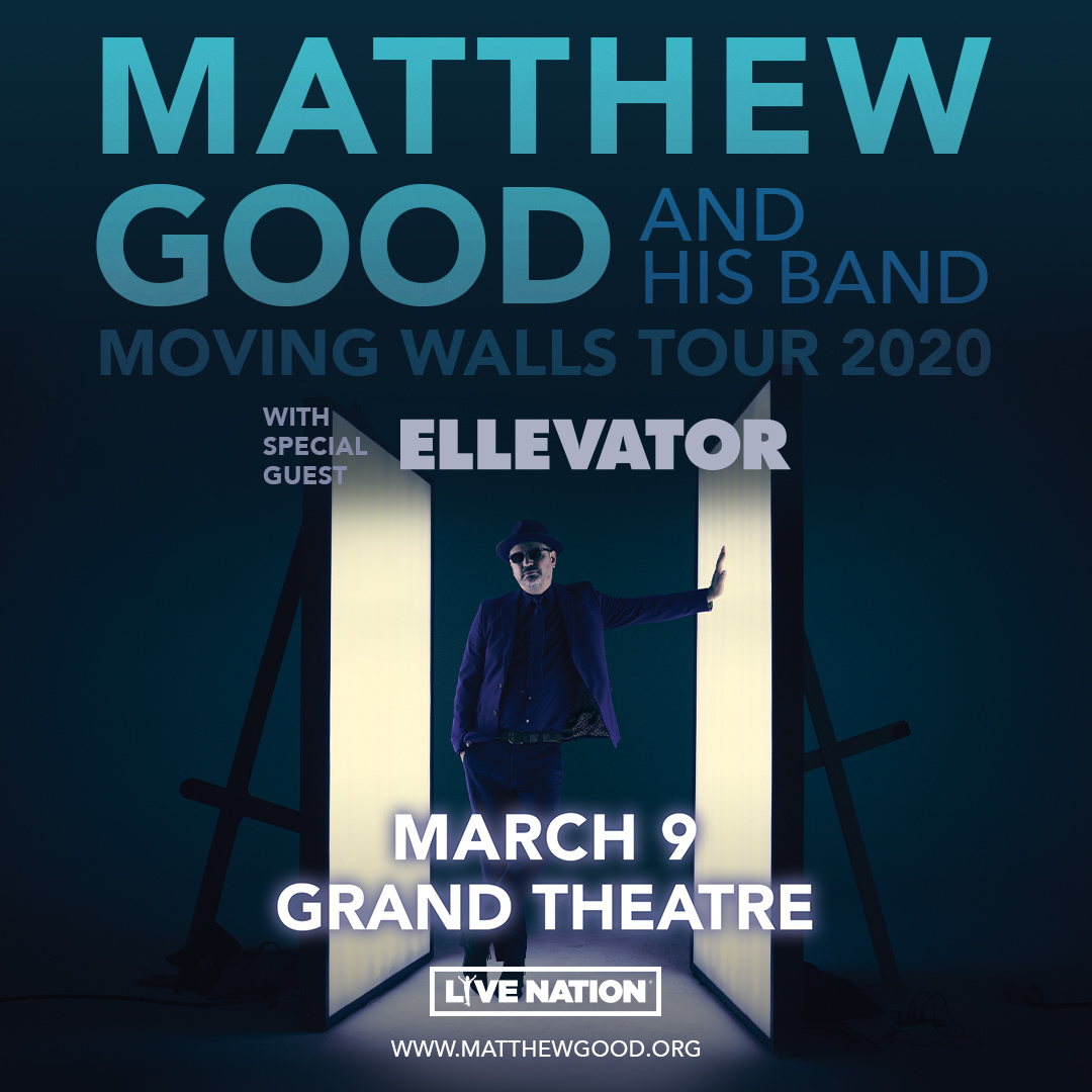 Matthew Good Moving Walls Tour 2020 Matthew Good standing between two lit screens