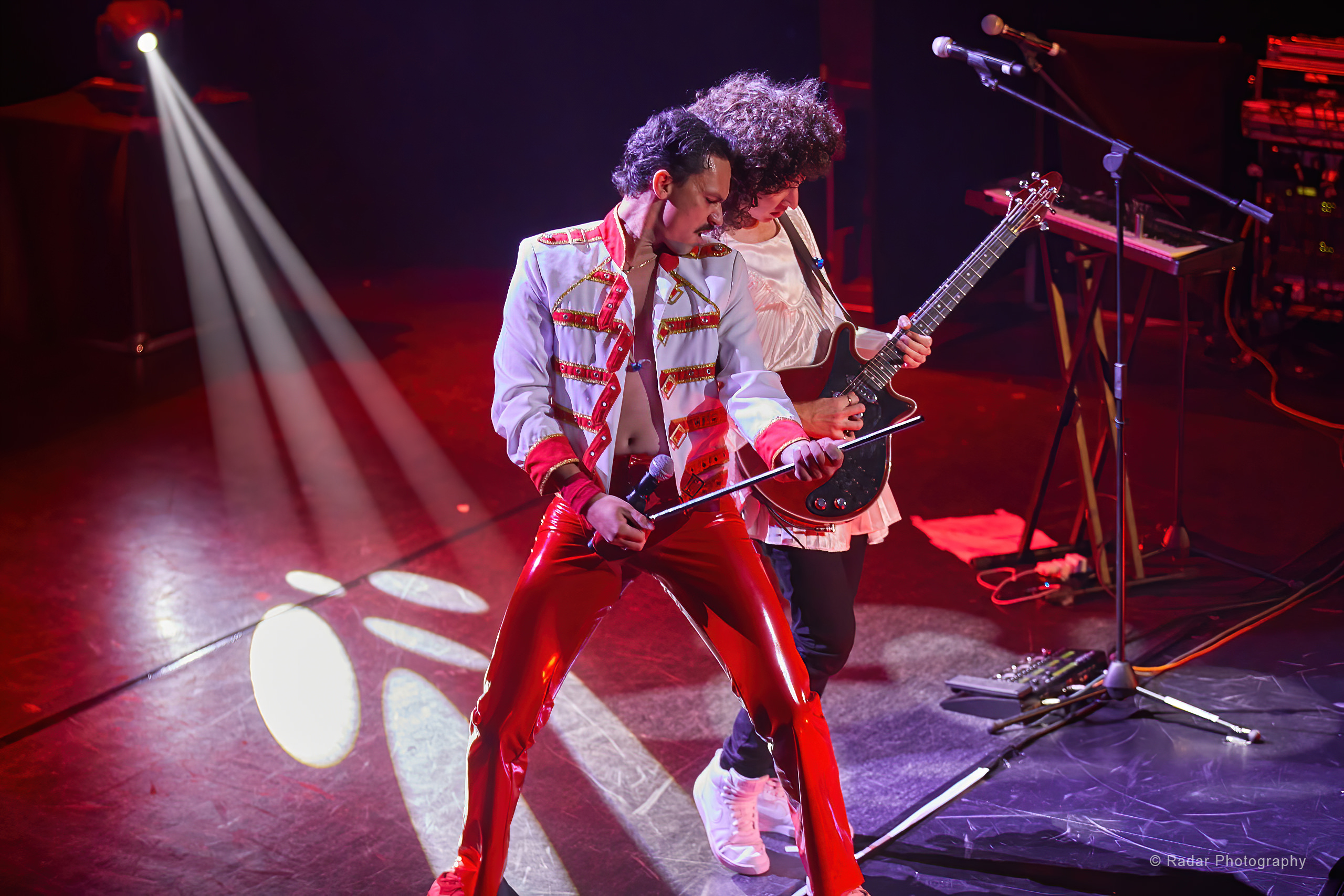 Queen: It's a Kinda Magic Queen performers on stage