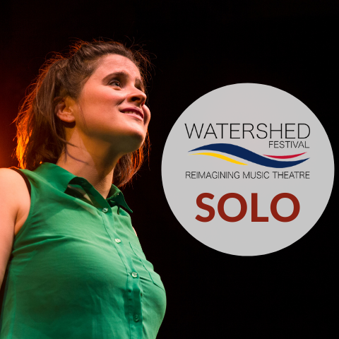 SOLO a lady on stage in a green shirt