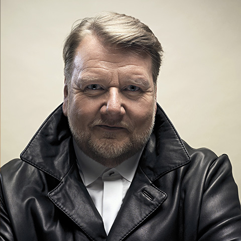 Ben Heppner in a black leather jacket