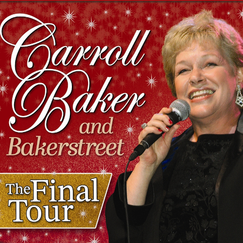 blonde haired lady singing into the microphone