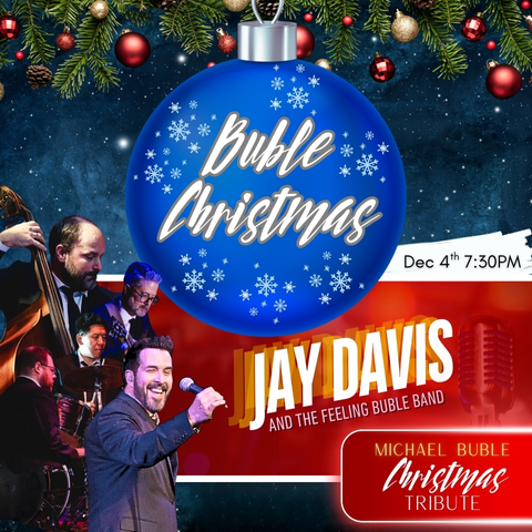 a blue christmas ornament with A BUBLE CHRISTMAS in the middle