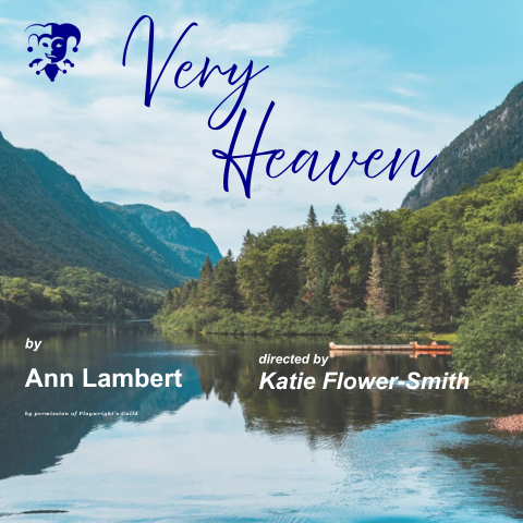 a very canadian scene with water/lake with mountains and trees