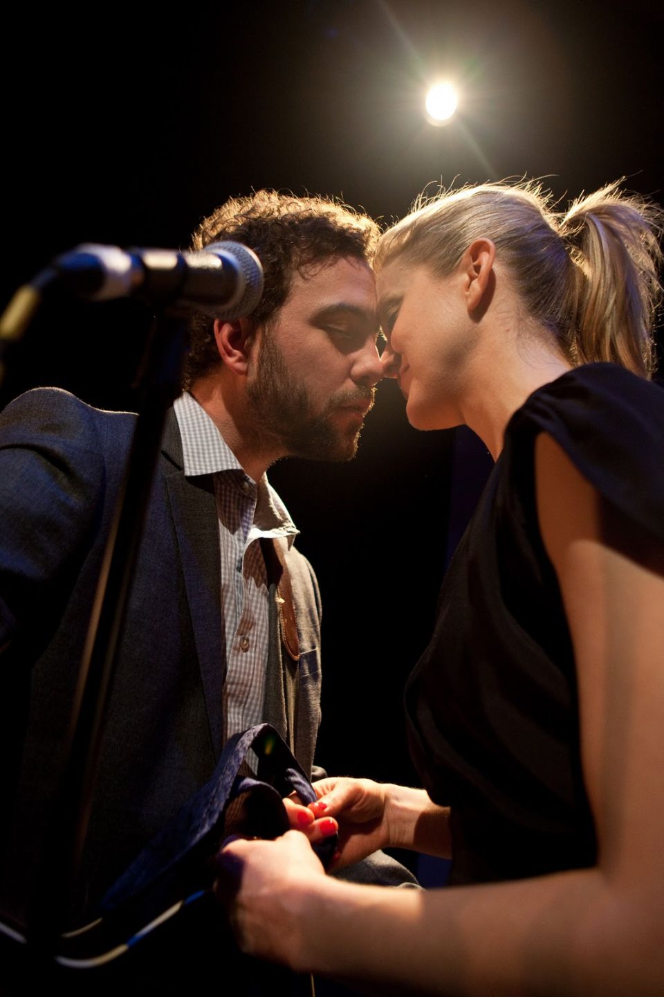 Out of the Woods male and female actors looking lovely at each other