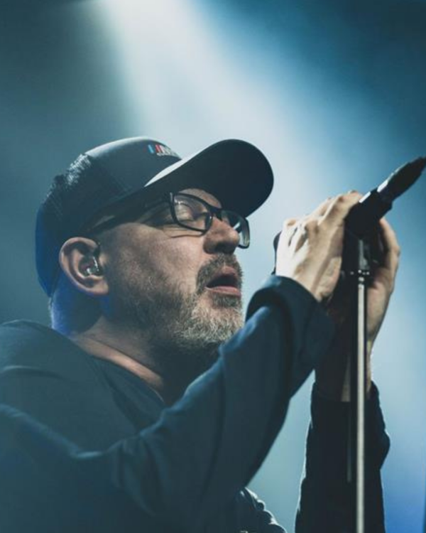 Matthew Good singing a microphone