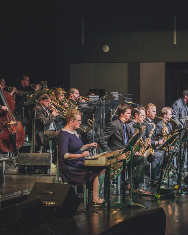 Side view of the orchestra playing