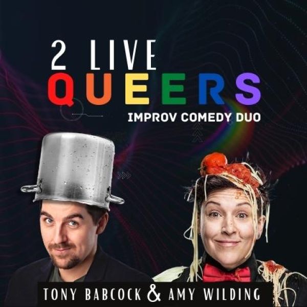 2 Live Queers - Improv Comedy Duo comedy duo, one has a pot on as a hat, the other their hair covered in spaghetti