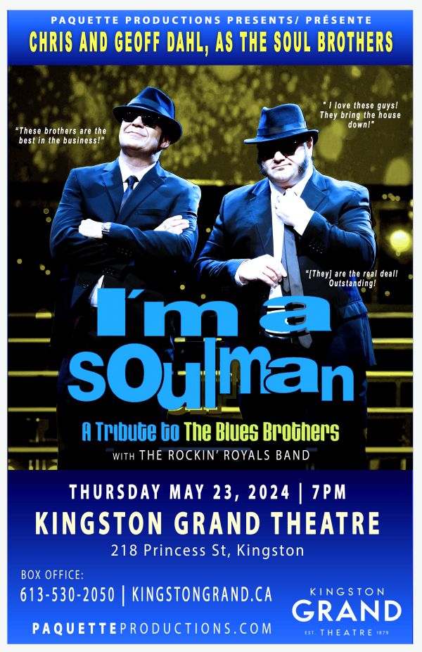 two males dressed in blue suits with hats and sunglasses