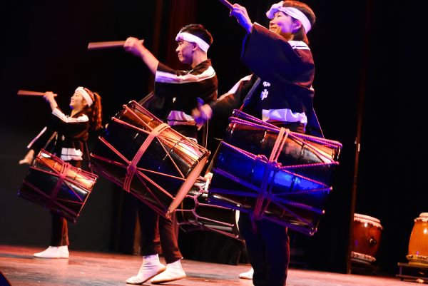 Drummers performing on stage