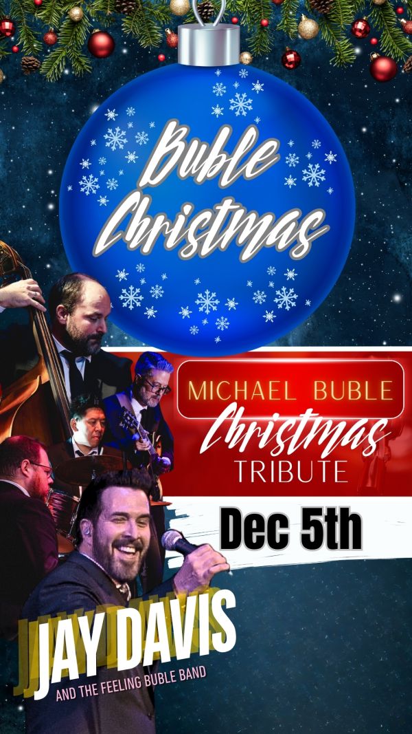 a blue christmas ornament with A BUBLE CHRISTMAS in the middle