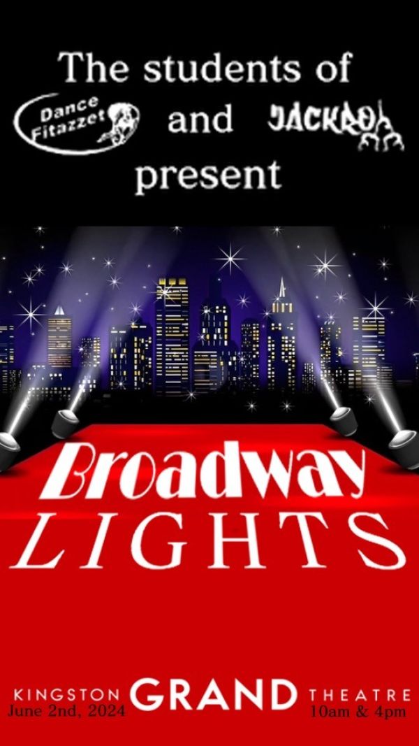 Red carpet at the front with Broadway at the back with search lights on each side.