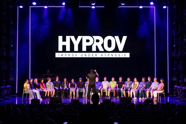 Volunteers from the audience participating in Hyprov