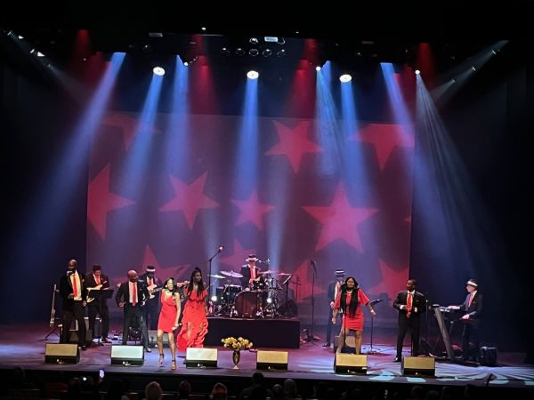 haze and lights with performers on stage