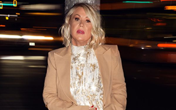 Jann Arden (white women with blonde hair) in a beige jacket