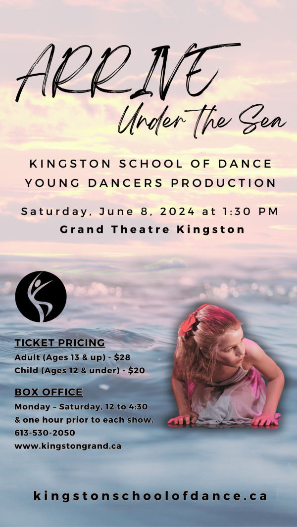 A dancer kneeling at the waters edge with a sunset over the water in the background