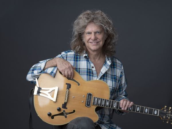 Pat Metheny with his guitar