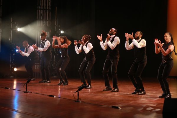 Dancers performing Step Afrika! on stage