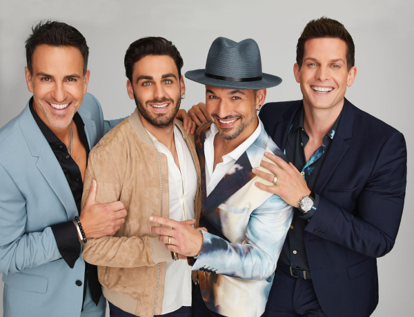 Four well dressed men who are members of The Tenors