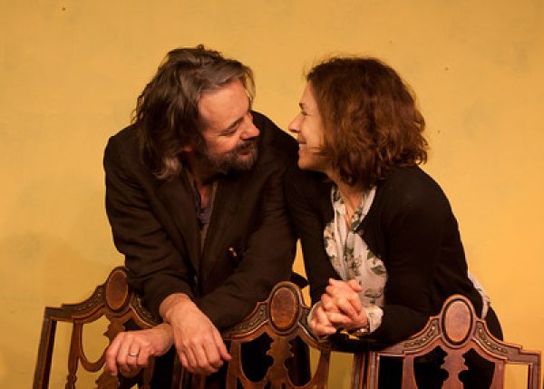 actors in a tender embrace