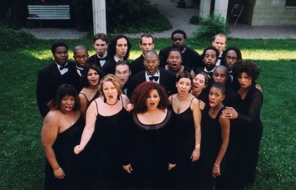 Harriet Tubman - When I crossed that line to freedom The Nathaniel Dett Chorale singing together on a lush green lawn