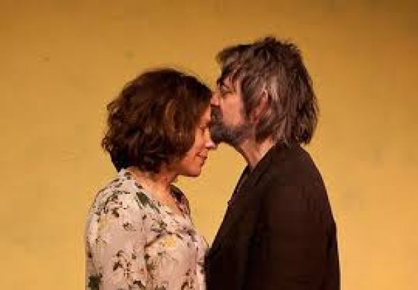 actors in a tender embrace