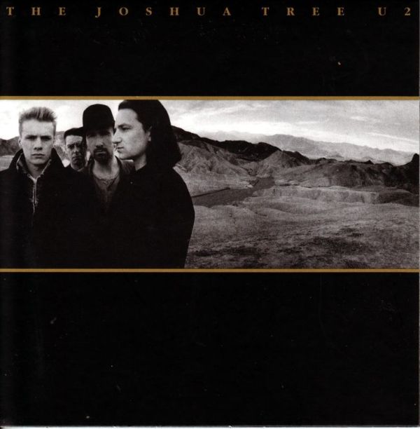 Cover of U2's Joshua Tree album with four men standing in the desert